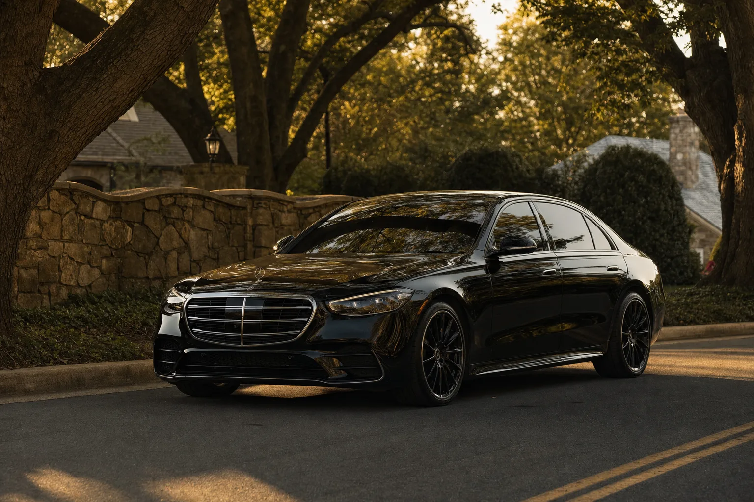 Black Mercedes-Benz S580 sedan in Falls Church, VA at golden hour, Monarch luxury chauffeur service