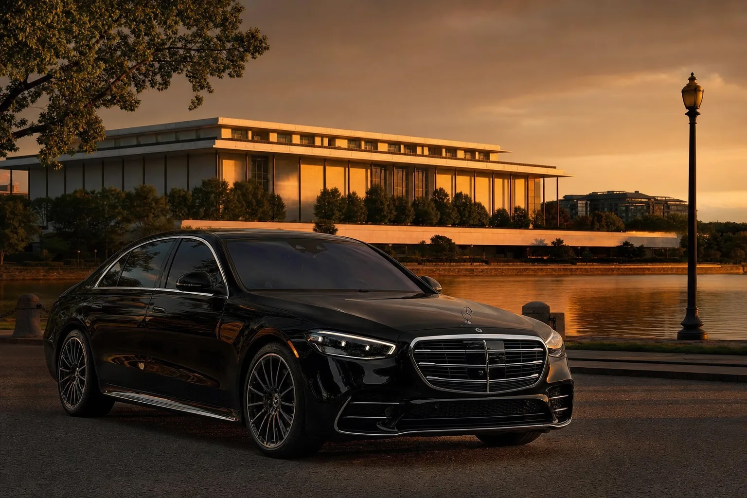 Black Mercedes-Benz S580 sedan in Foggy Bottom, DC at golden hour, Monarch luxury chauffeur service