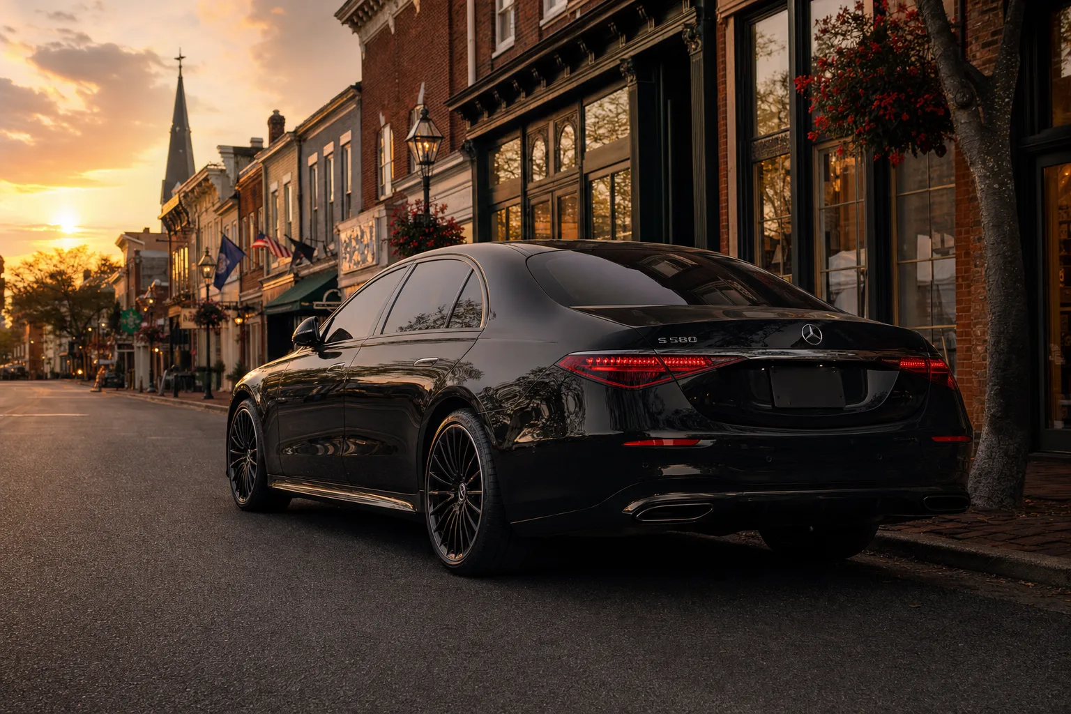 Black Mercedes-Benz S580 sedan in Leesburg, VA at golden hour, Monarch luxury chauffeur service