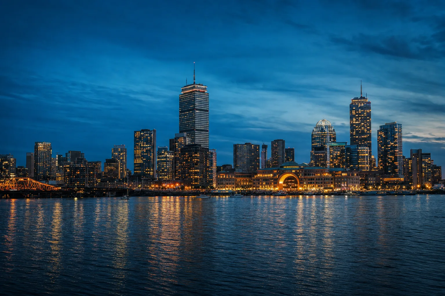 Boston, MA skyline at dusk, served by Monarch chauffeur and limo service