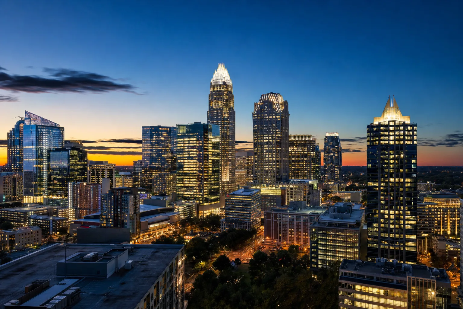 Charlotte, NC skyline at dusk, served by Monarch chauffeur service