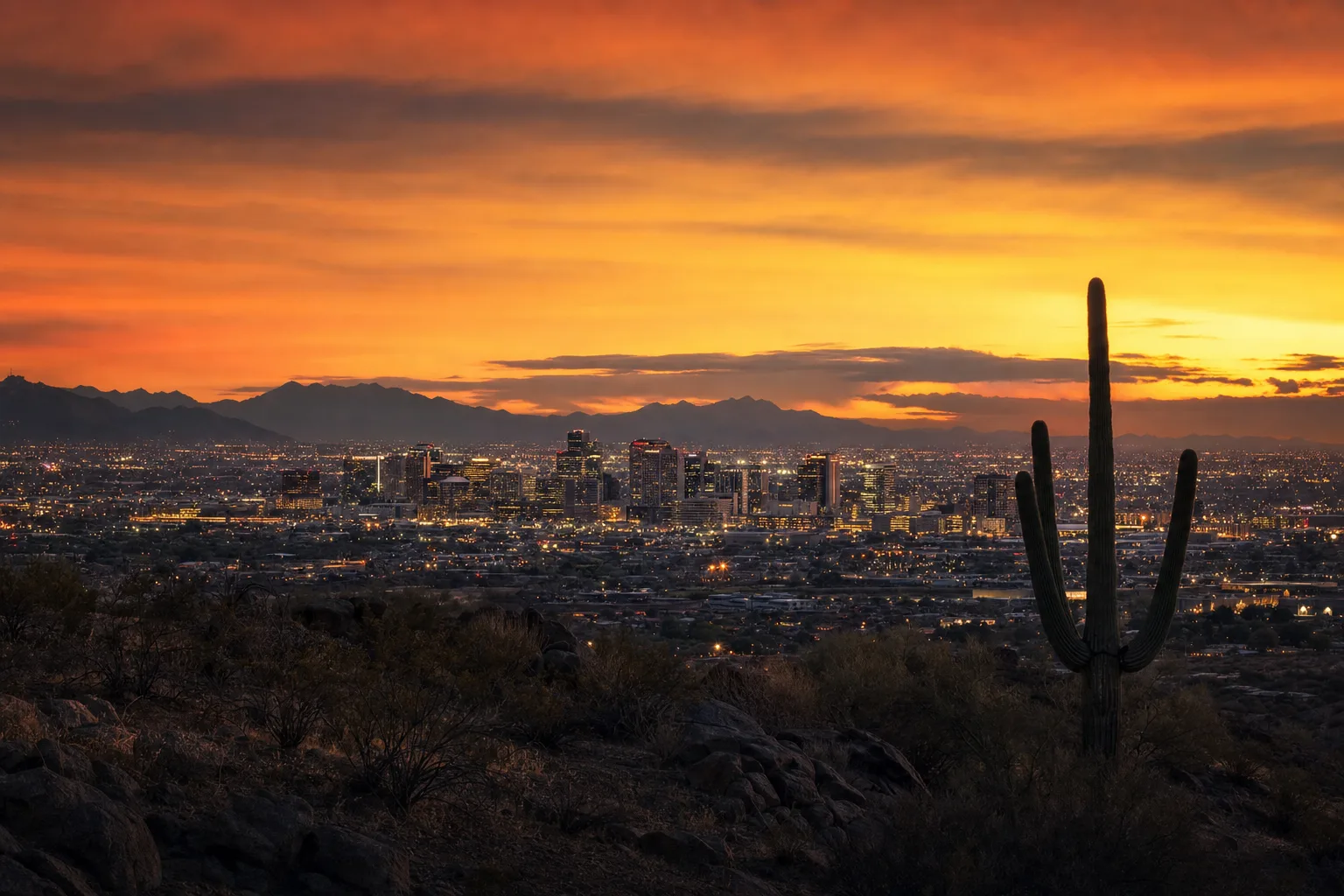 Phoenix, AZ skyline at dusk, served by Monarch chauffeur and limo service