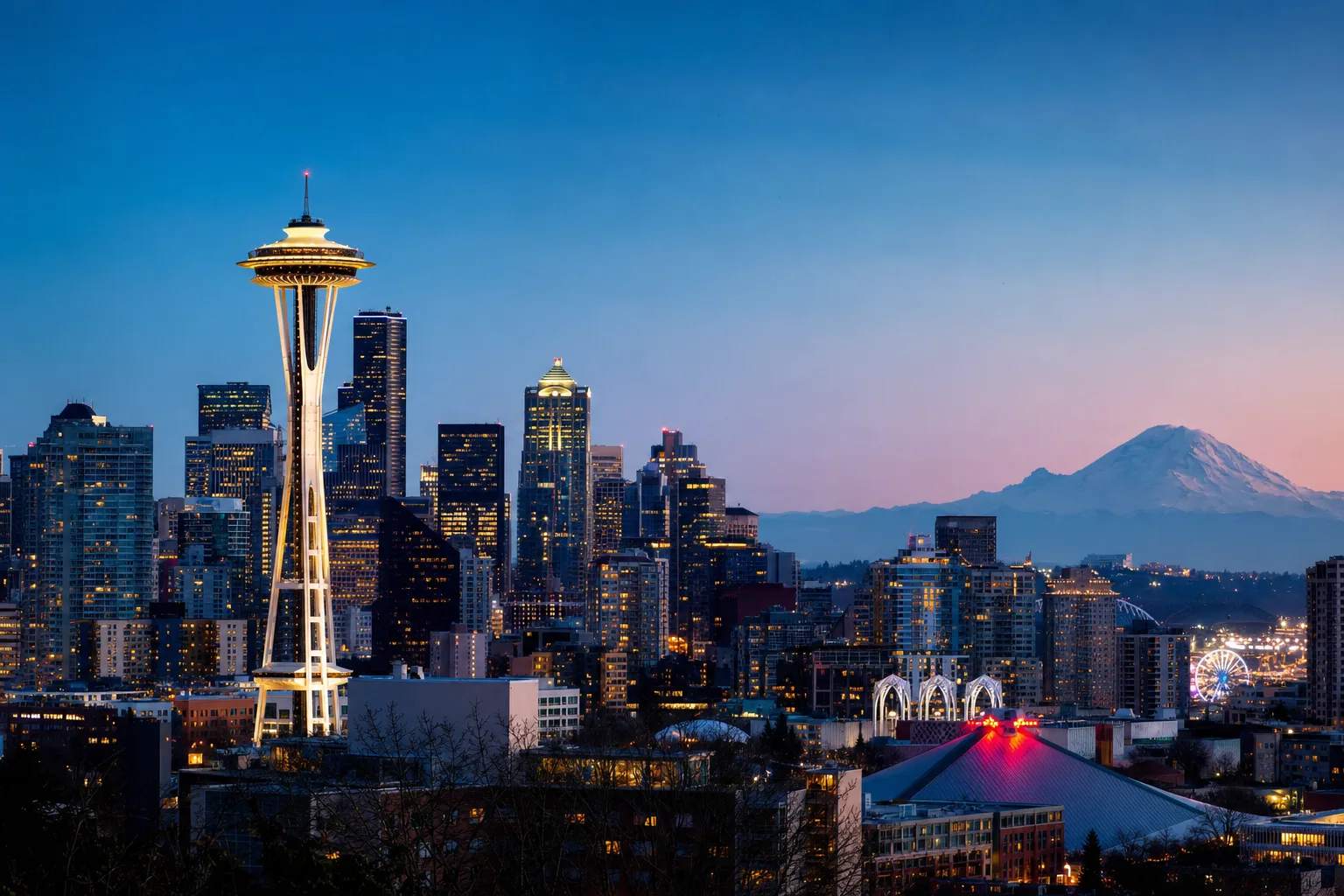 Seattle, WA skyline at dusk, served by Monarch chauffeur service