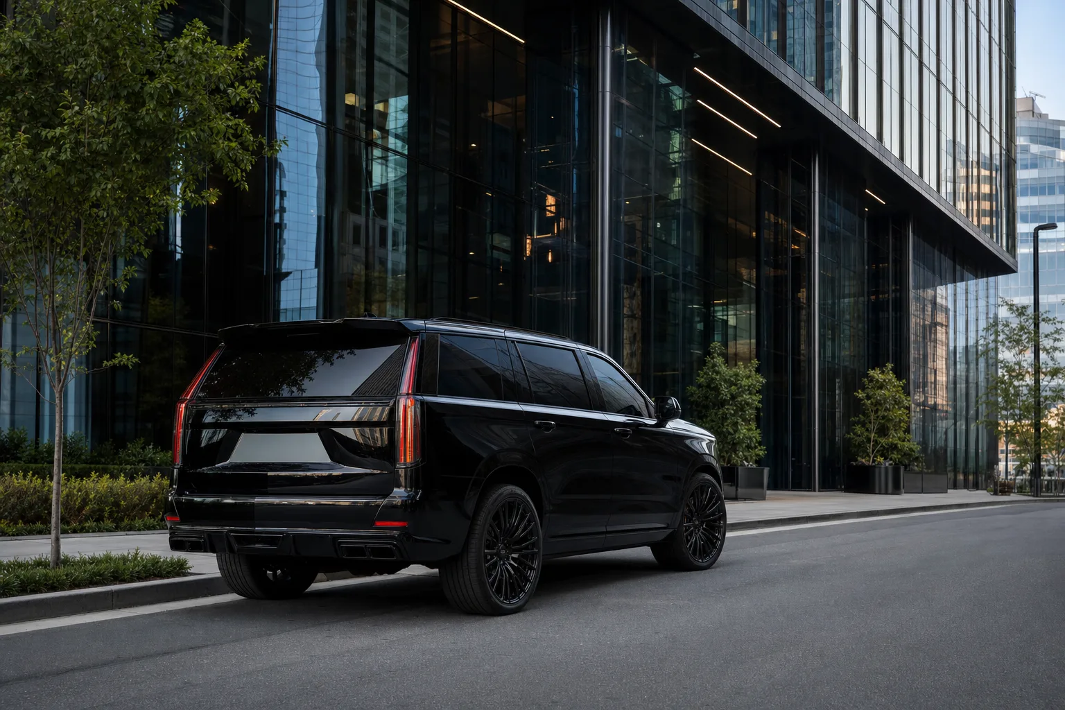 Black executive SUV outside a Tysons Corner corporate tower for diplomatic travel